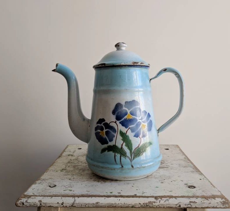 light blue enamelware coffee pot