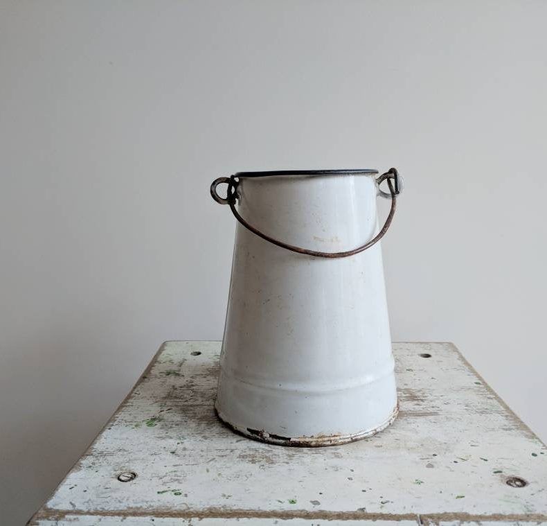 simple white farmhouse milk pail