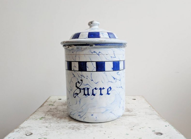 vintage sugar container in white and blue