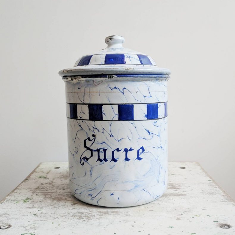 vintage sugar container in white and blue